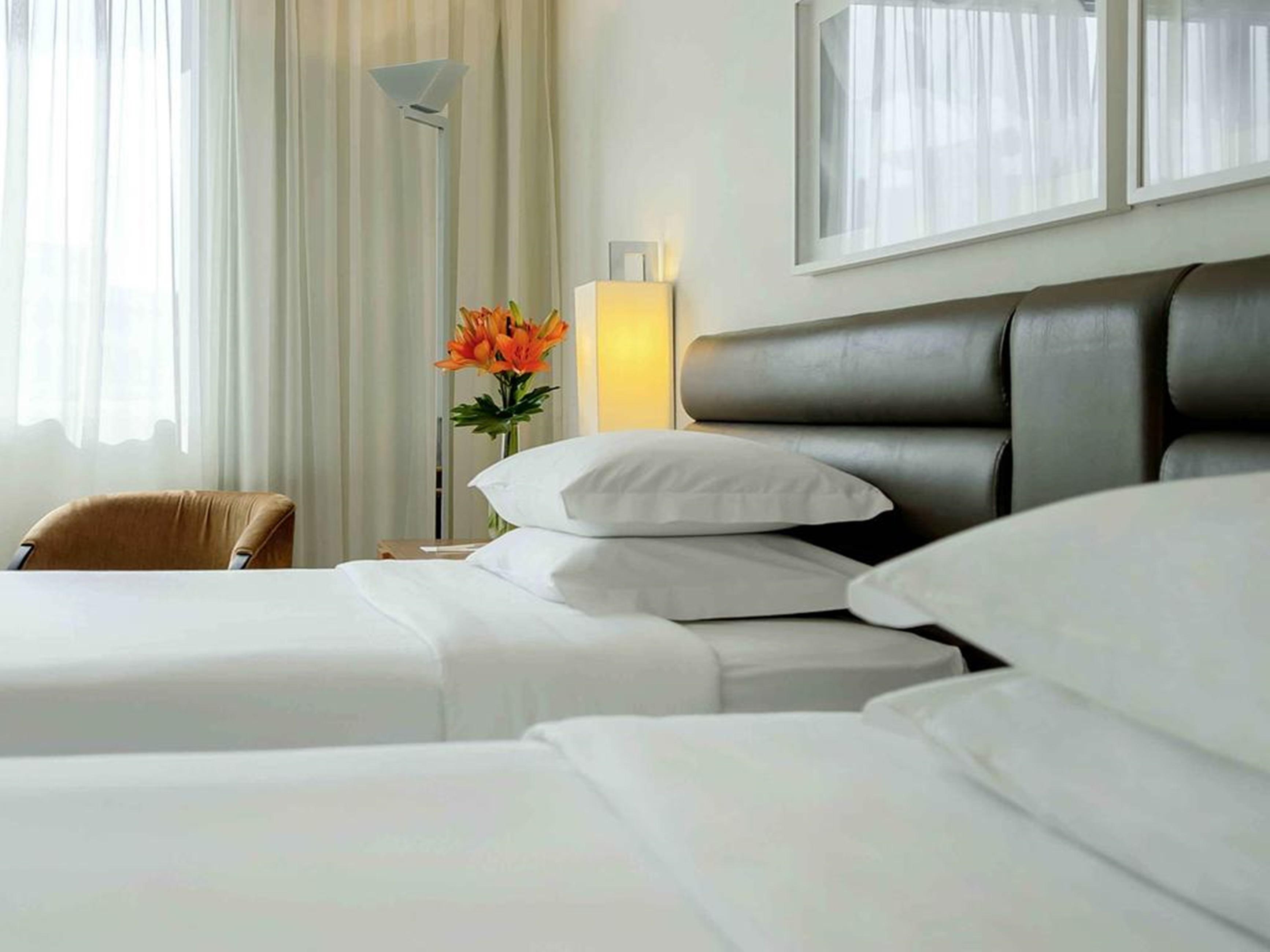 Grand Mercure Sao Paulo Vila Olimpia Exterior foto A bed with pillows